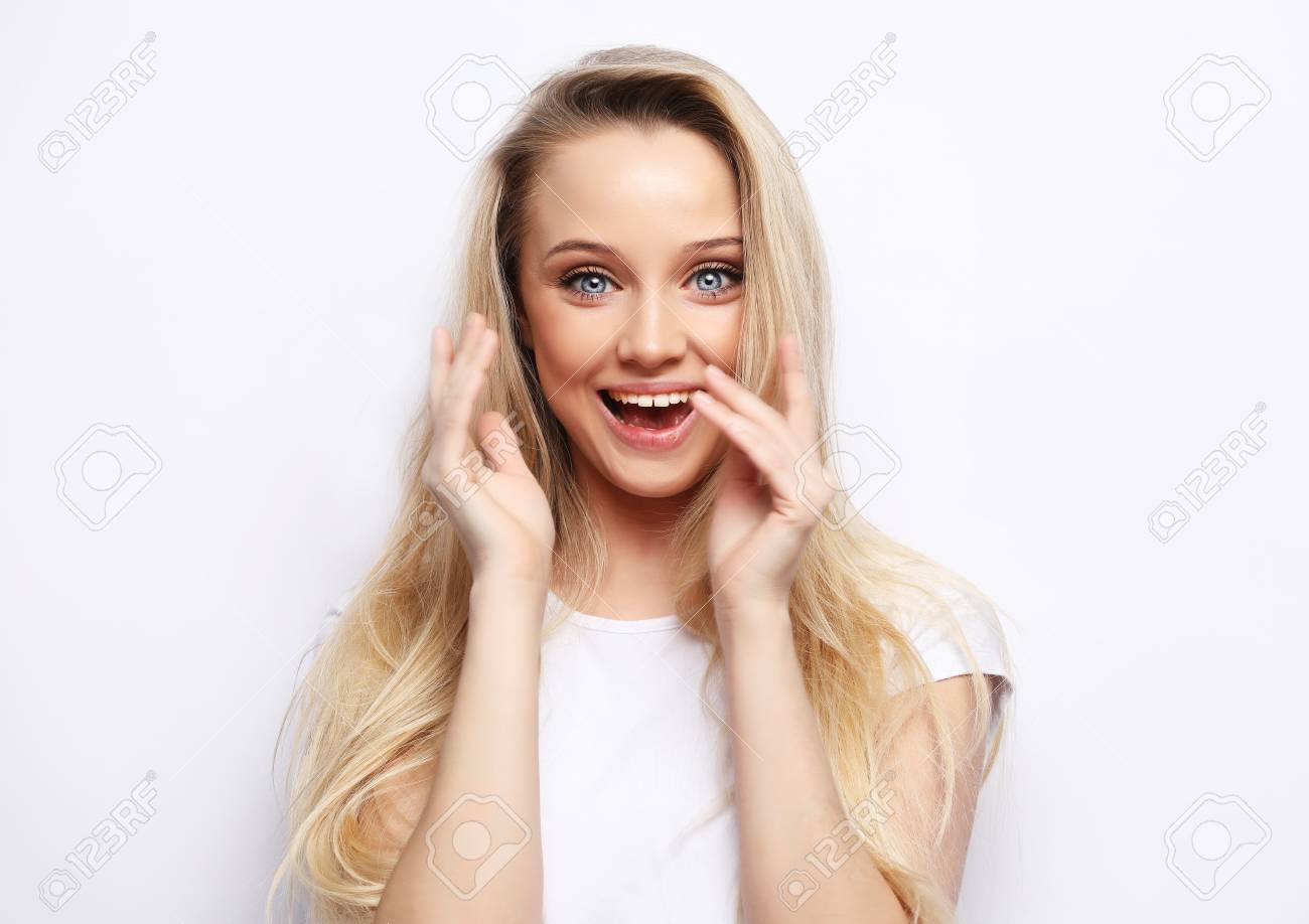 Lifestyle And People Concept - Beautiful Girl Surprised And Shocked Looks  On You . Presenting Your Product. Expressive Facial Expressions. Stock  Photo, Picture And Royalty Free Image. Image 104821186.