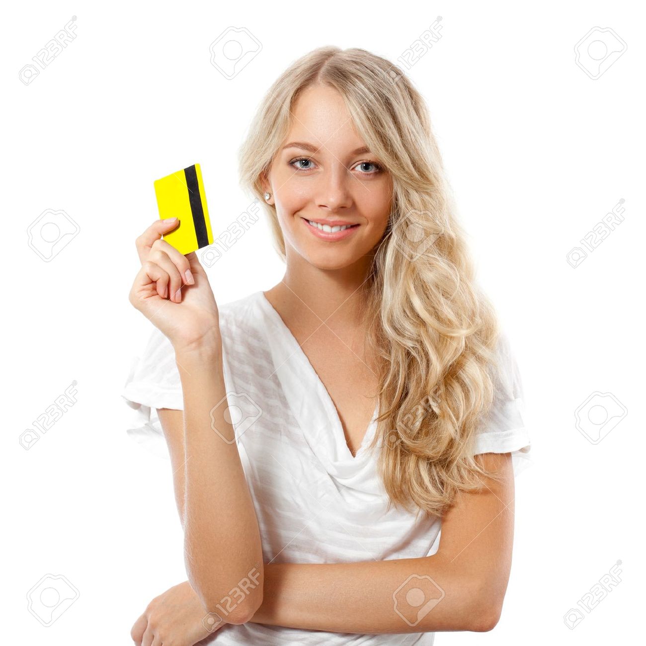 blonde happy woman holding yellow credit card stock photo picture
