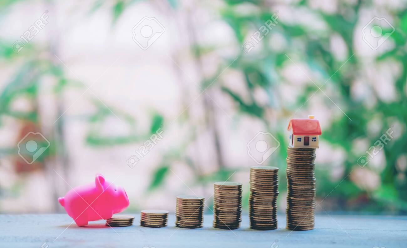 Small house add coin column The concept of saving money, investment properties - 122398536 Small house add coin column The concept of saving money, investment properties - 122398536