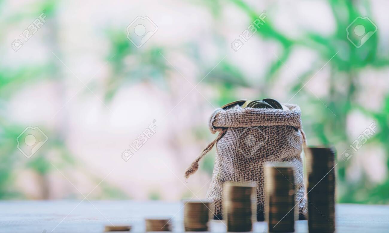 Planting coins in hemp bags - investment ideas for growth - 122398352 Planting coins in hemp bags - investment ideas for growth - 122398352