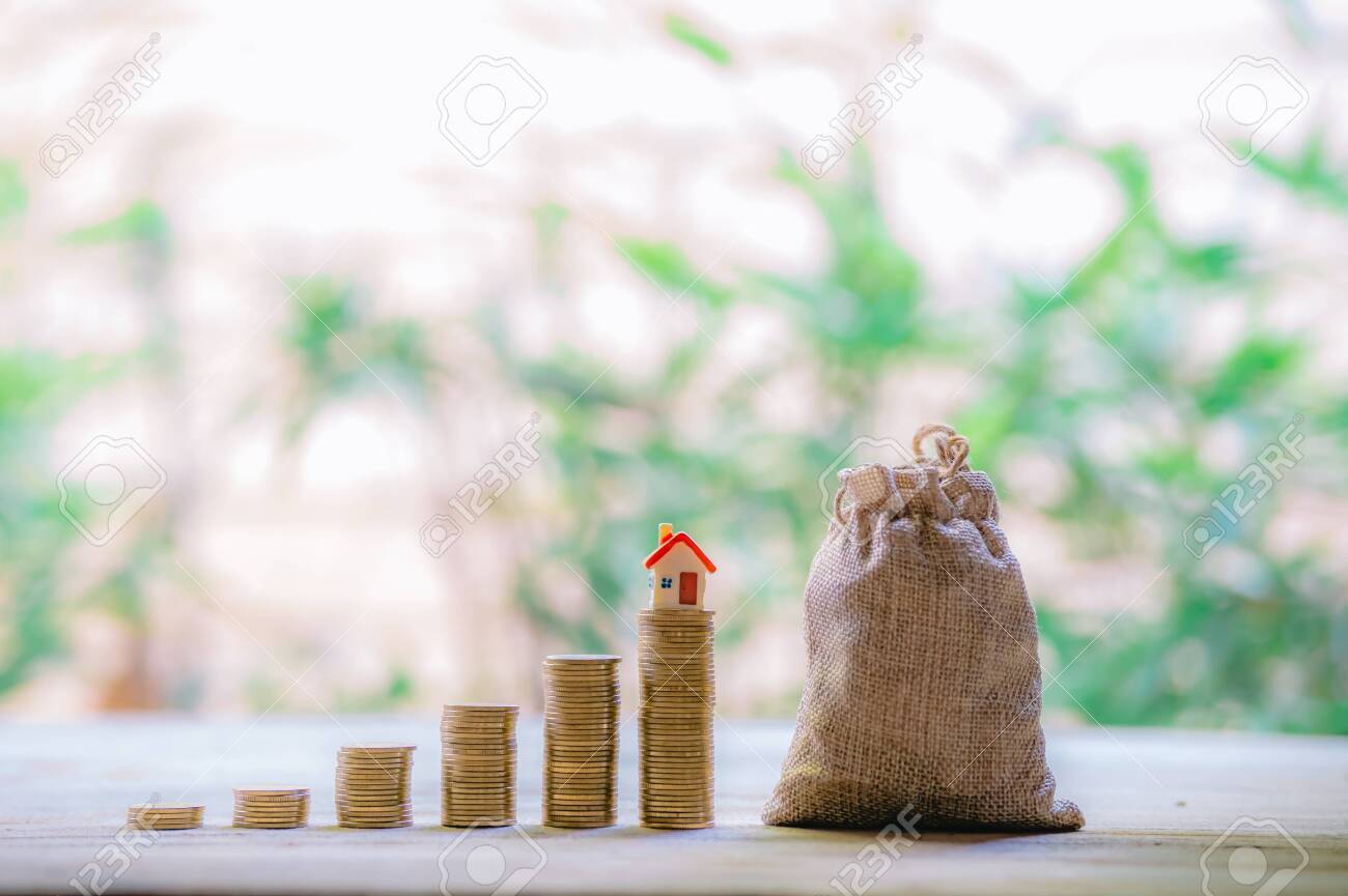Small house add coin column The concept of saving money, investment properties - 122398349 Small house add coin column The concept of saving money, investment properties - 122398349