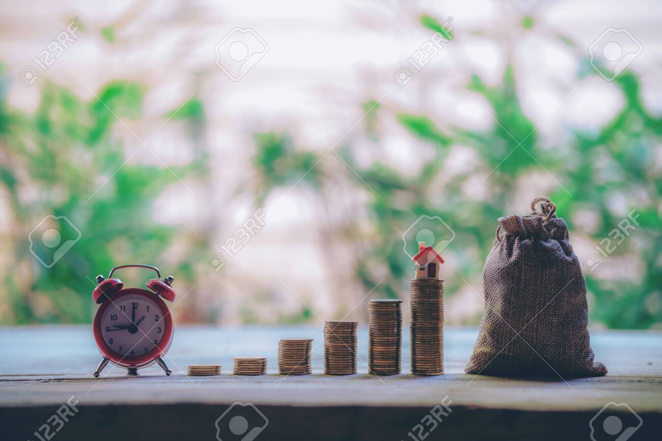 Small house add coin column The concept of saving money, investment properties - 122398351 Small house add coin column The concept of saving money, investment properties - 122398351