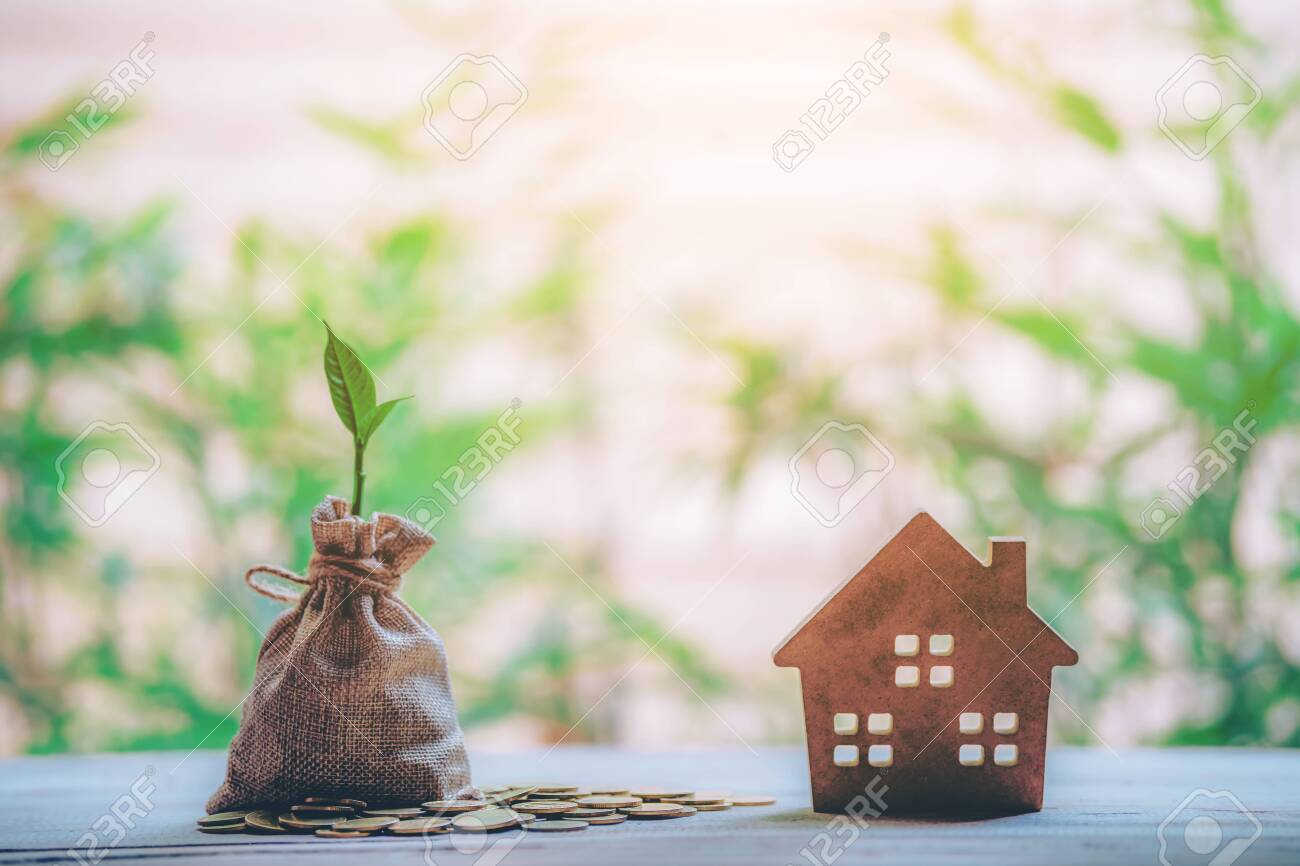Small house add coin column The concept of saving money, investment properties - 122398229 Small house add coin column The concept of saving money, investment properties - 122398229
