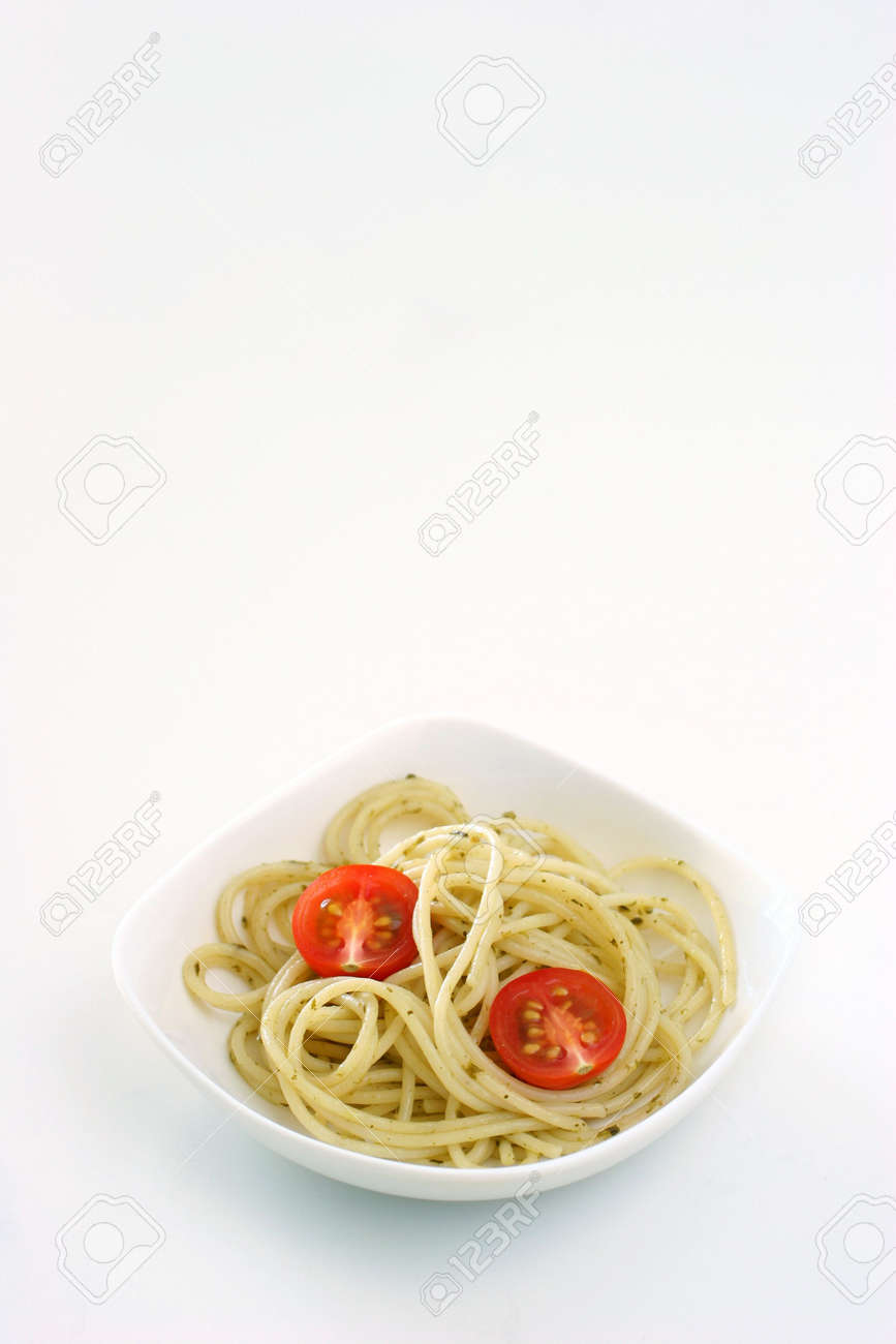 Plain Pasta Olio In Small Square Shaped Bowl In A White Background