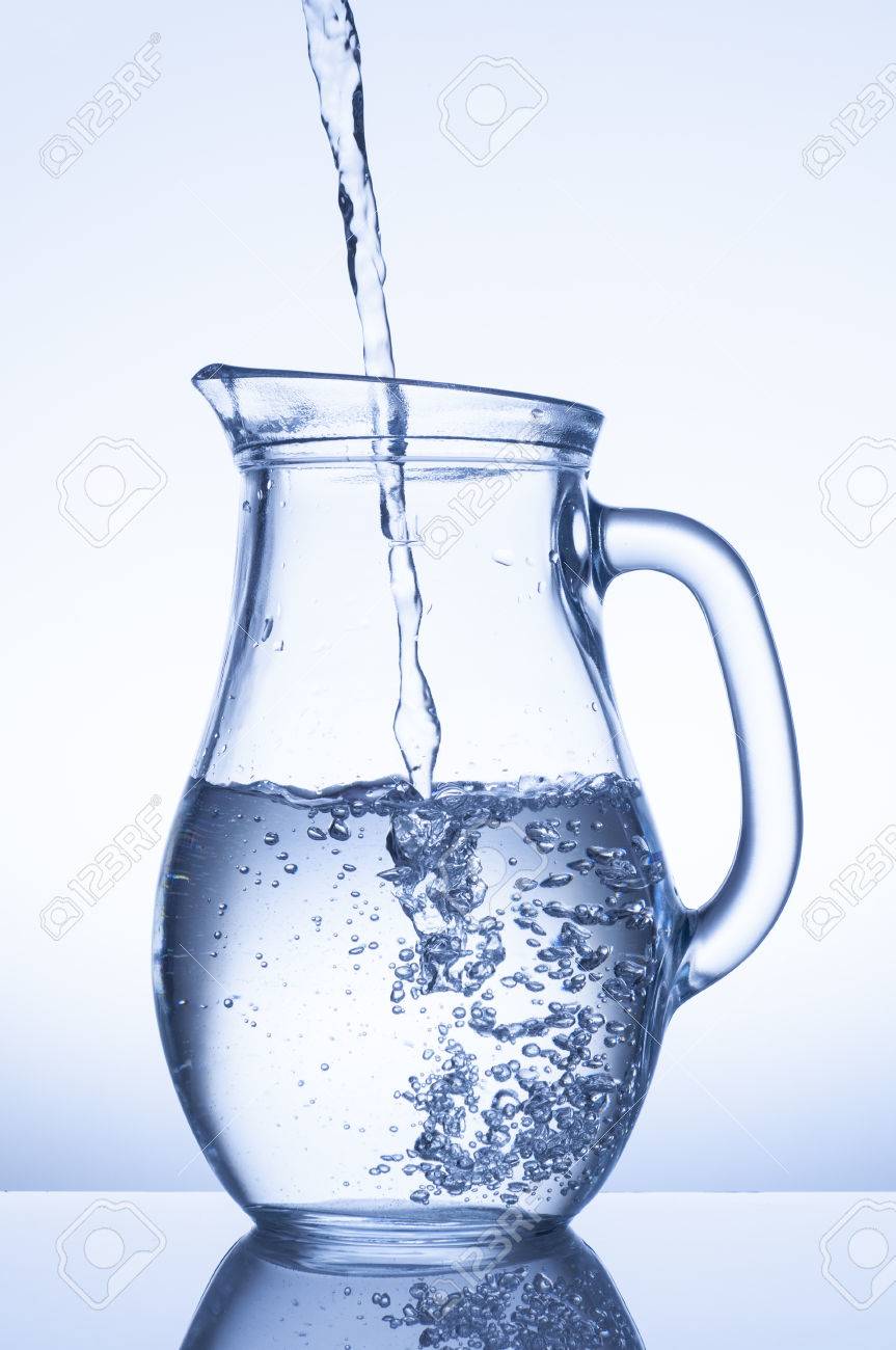 Download Flowing Water In A Jug On Blue Stock Photo Picture And Royalty Free Image Image 22844072 Yellowimages Mockups