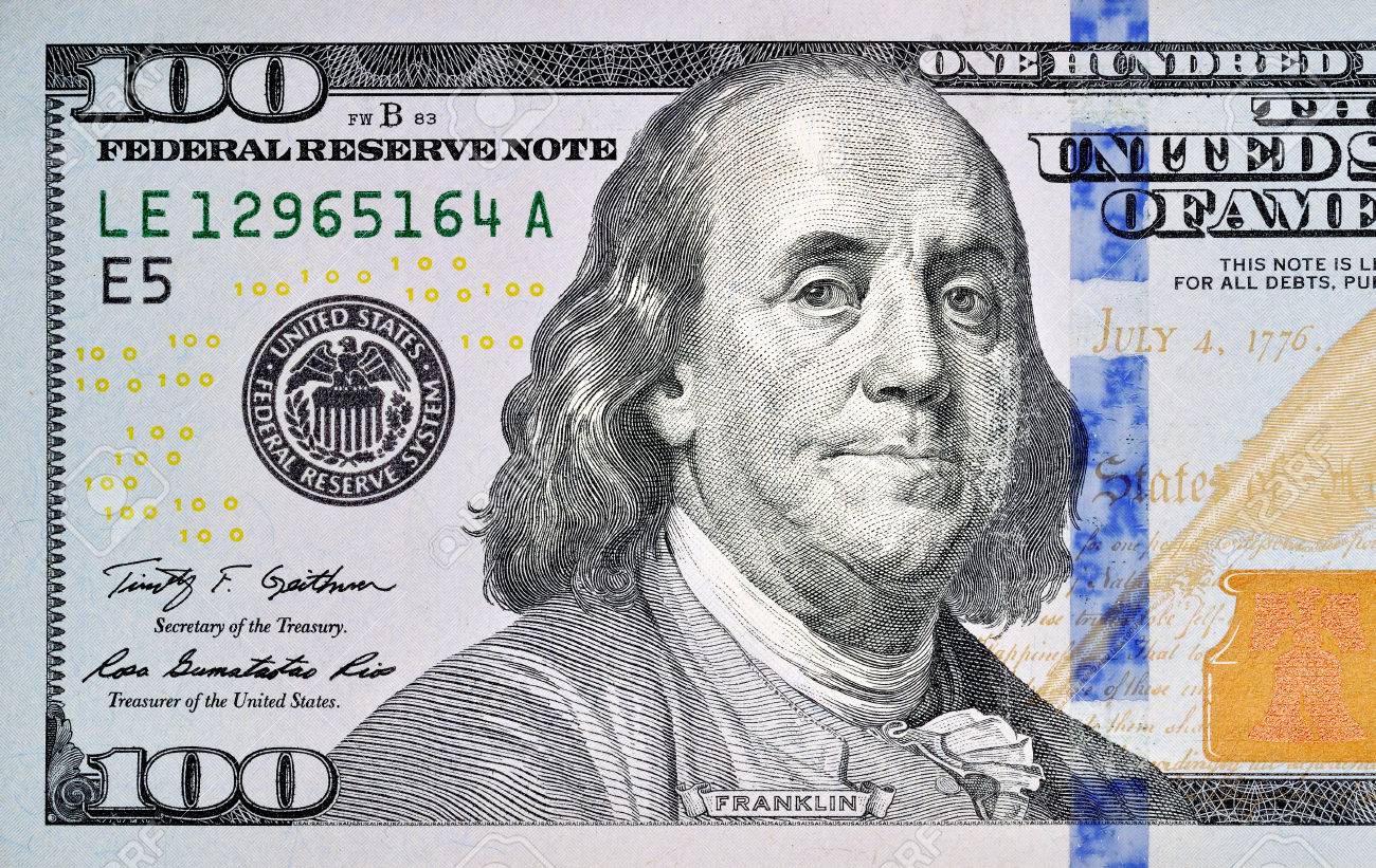 32769226-one-hundred-dollar-bill-closeup.jpg