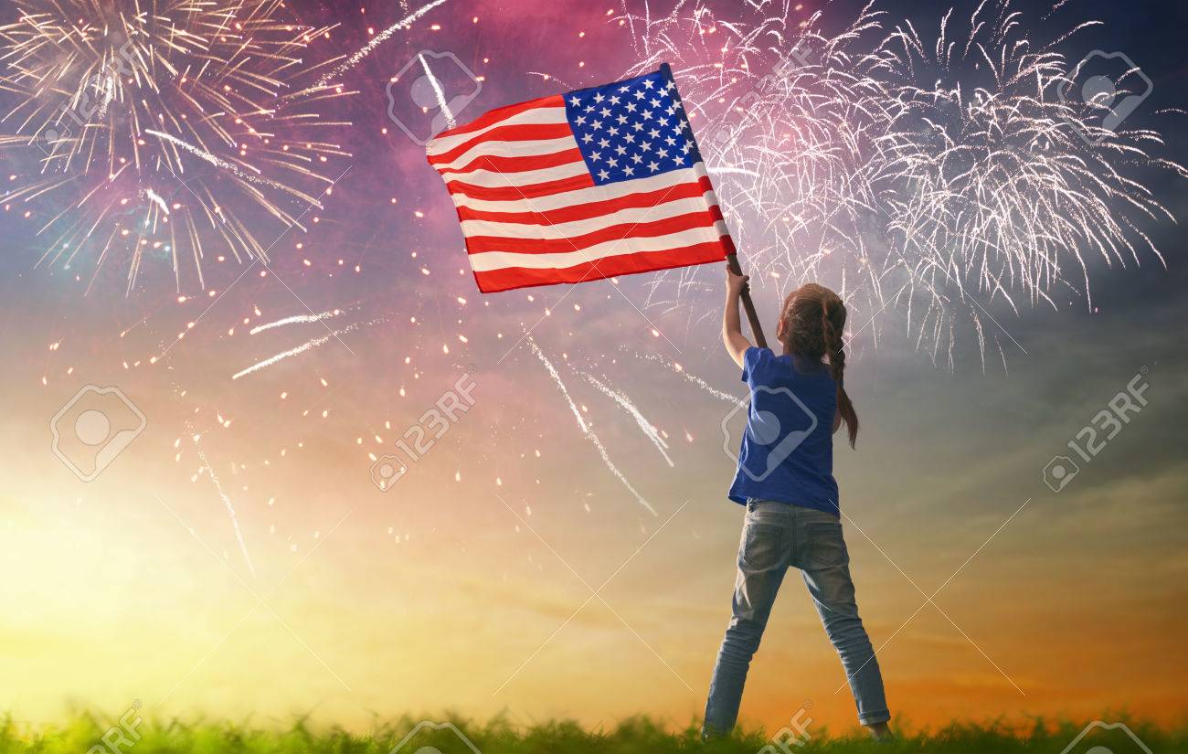 Patriotic holiday. Happy kid, cute little child girl with American flag. USA celebrate 4th of July. - 78504498 Patriotic holiday. Happy kid, cute little child girl with American flag. USA celebrate 4th of July. - 78504498