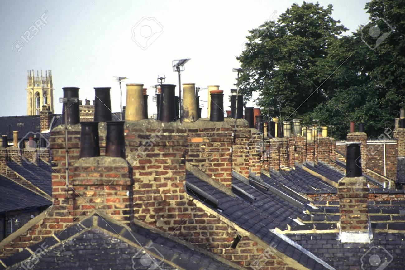 old victorian terraced house chimney stacks and chimney pots stock
