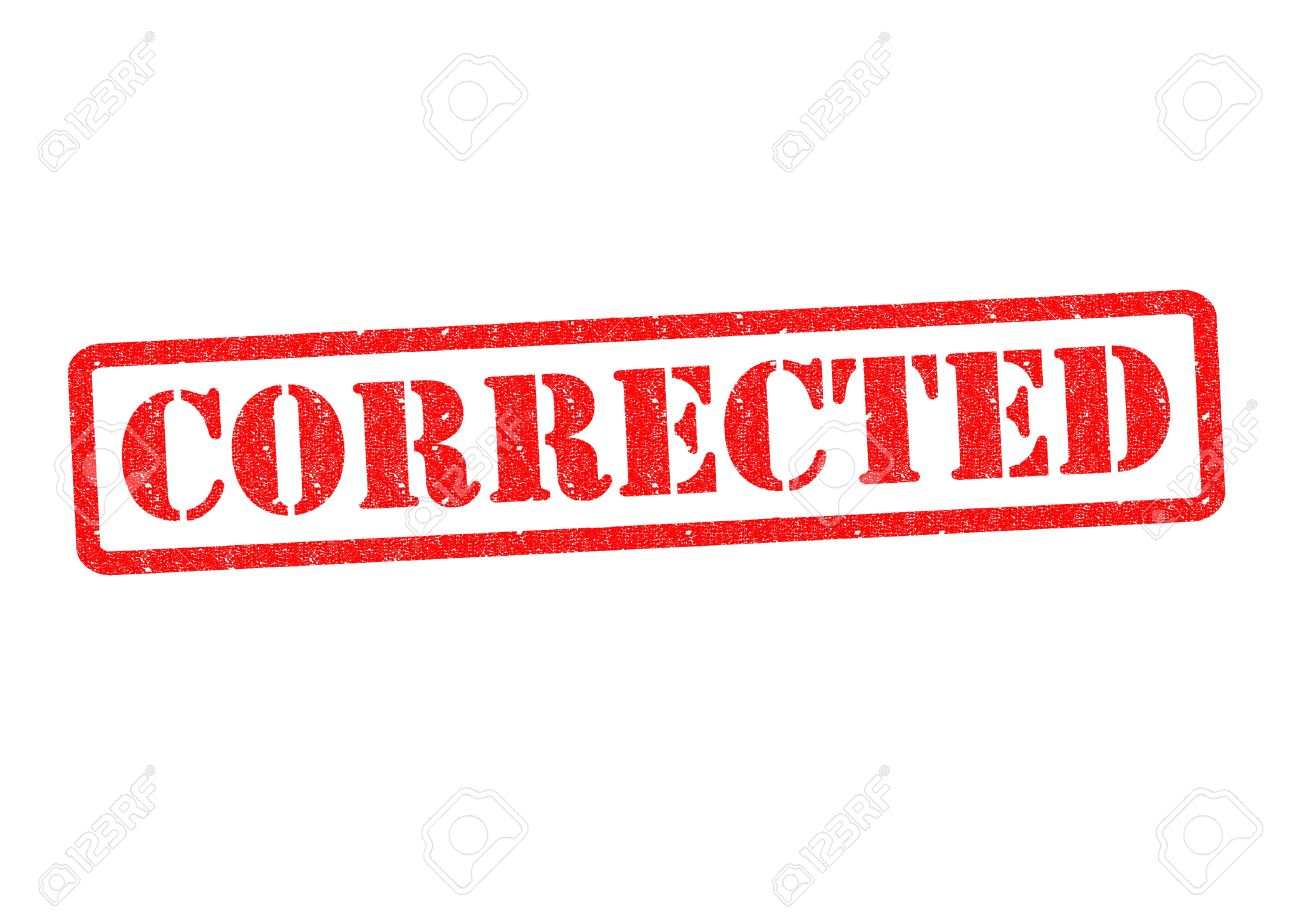 corrected rubber stamp over a white background stock photo picture