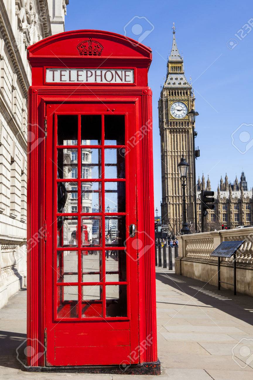 An iconic red Telephone Box with Big Ben in the background in London. - 39058226 An iconic red Telephone Box with Big Ben in the background in London. - 39058226