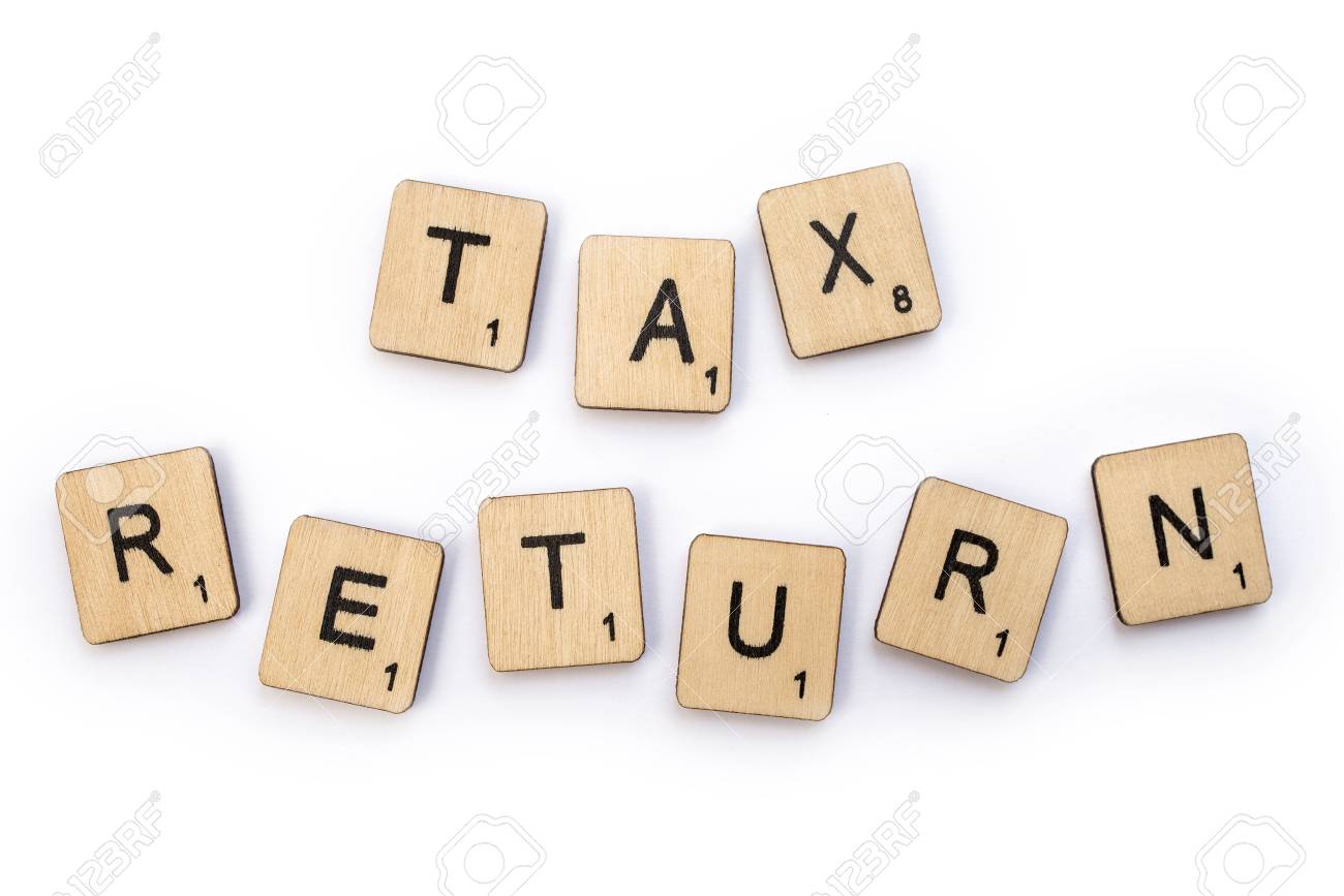 london uk july 5th 2018 tax return spelt with wooden letter
