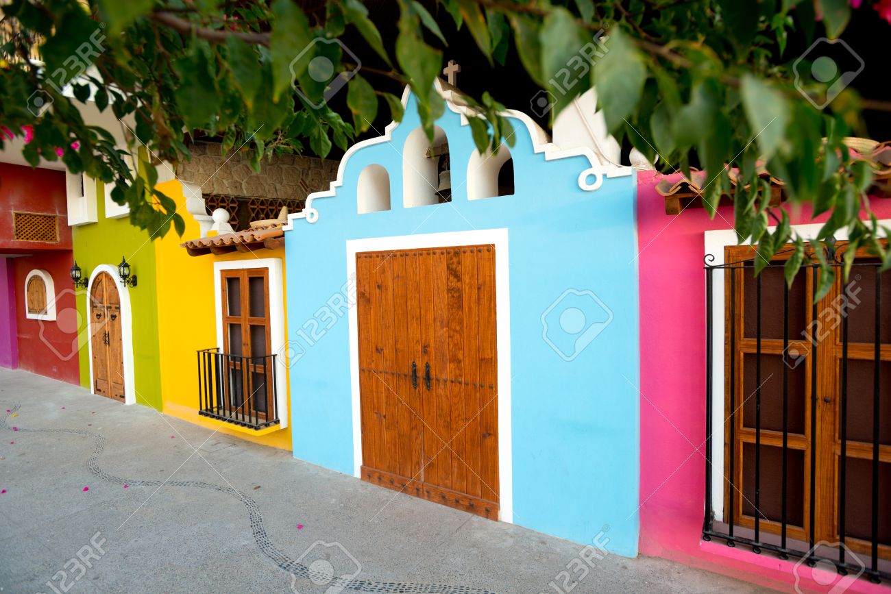this image bright facades of traditional mexican architecture this image bright facades of traditional mexican architecture