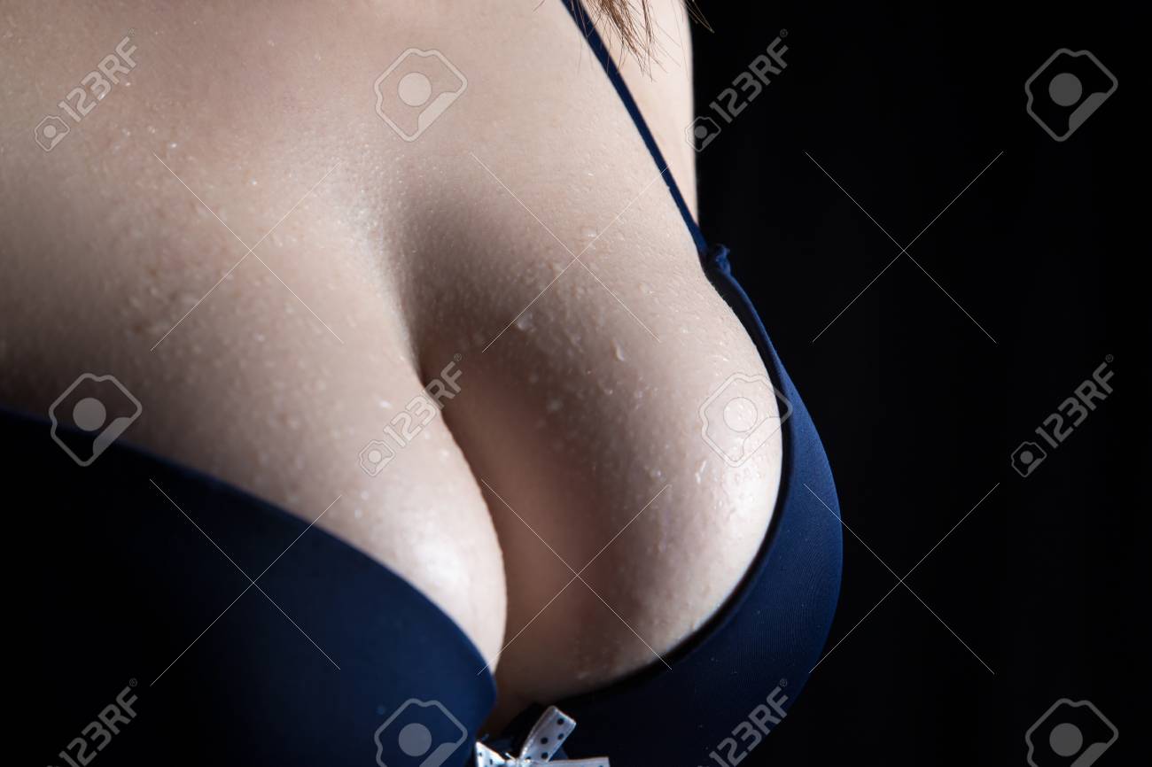 Young Womans Wet Tits In Blue Bra Stock Photo, Picture and Royalty Free  Image. Image 72192350.