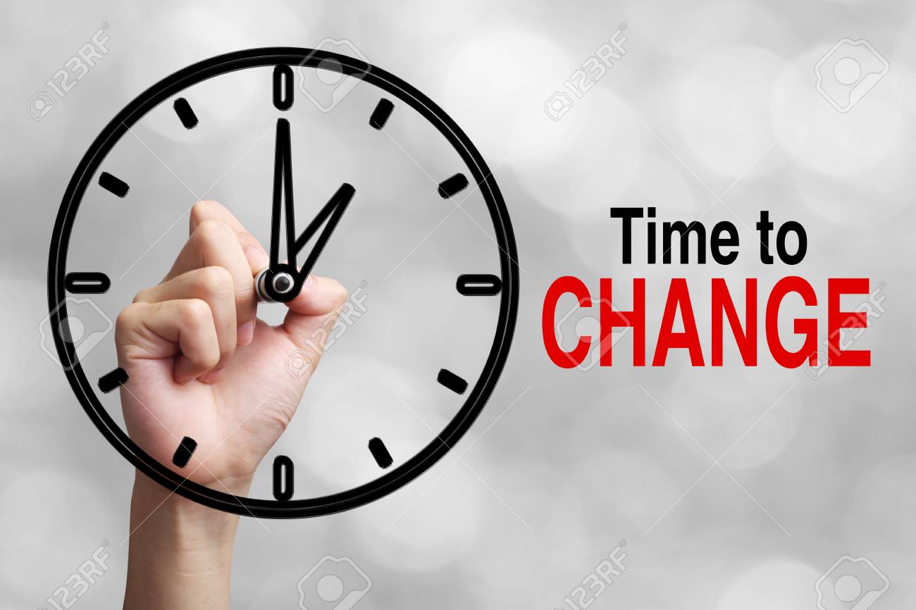Hand Is Drawing A Clock With Text Time To Change Concept Aside Stock Photo Picture And Royalty Free Image Image