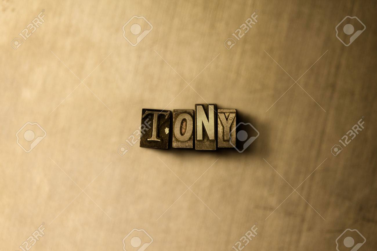 Tony Close Up Of Grungy Vintage Typeset Word On Metal Backdrop