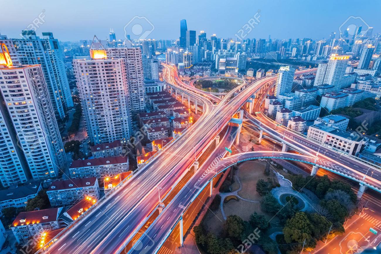 city interchange at nightfall in shanghai, modern transport infrastructure background - 38465398 city interchange at nightfall in shanghai, modern transport infrastructure background - 38465398