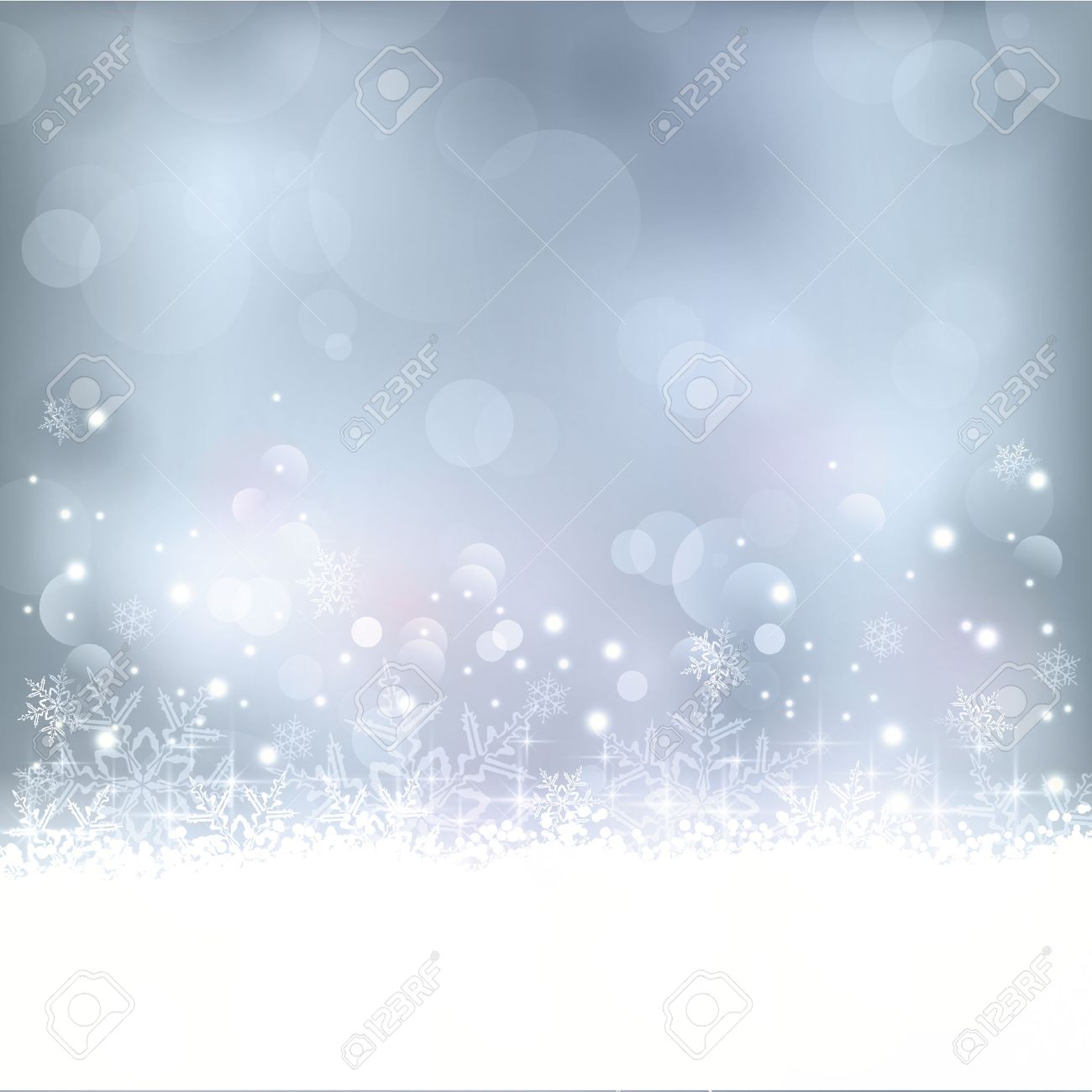 Wintry blue abstract background with out of focus light dots, stars,snowflakes and copy space. Great for the festive season of Christmas to come or any other winter occasion. - 32779968 Wintry blue abstract background with out of focus light dots, stars,snowflakes and copy space. Great for the festive season of Christmas to come or any other winter occasion. - 32779968