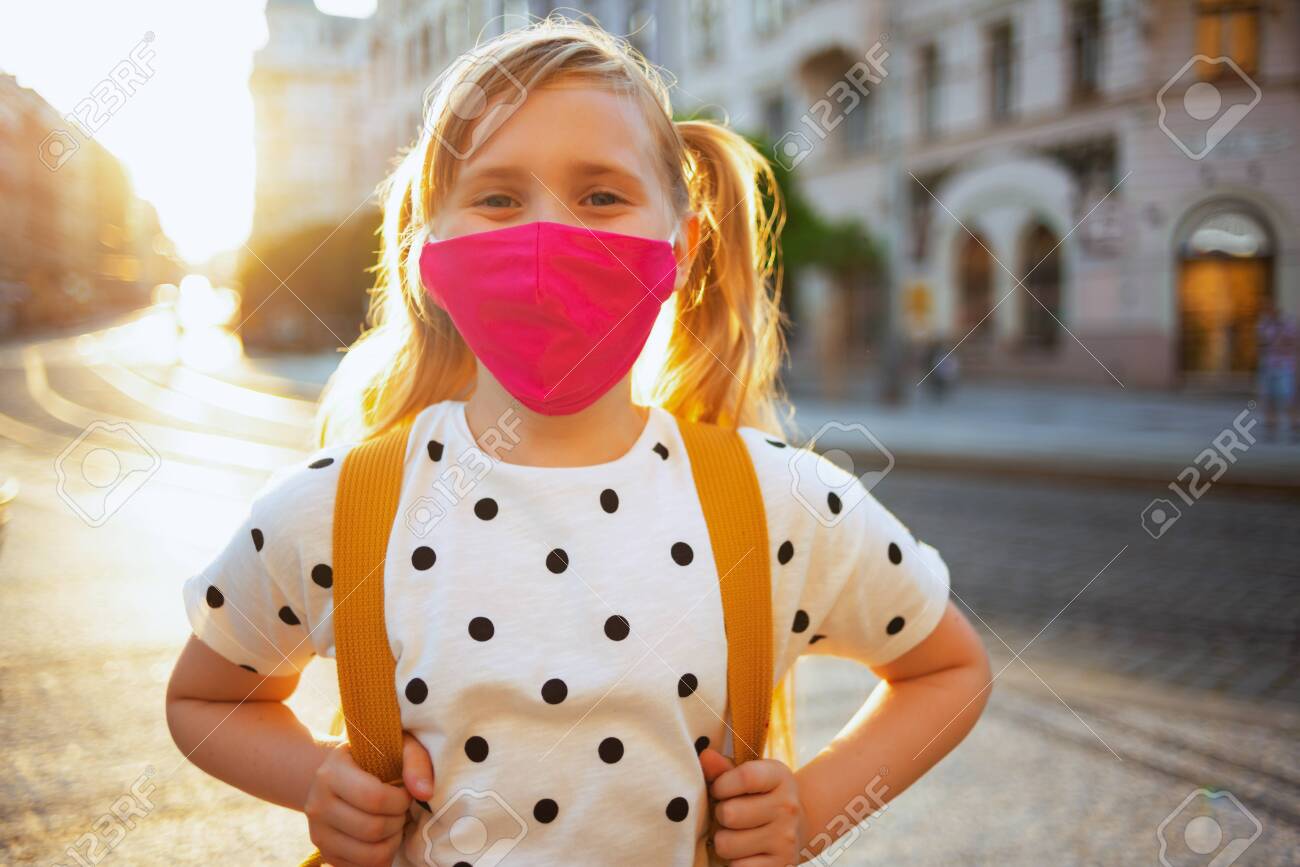 yellow and white polka dot blouse