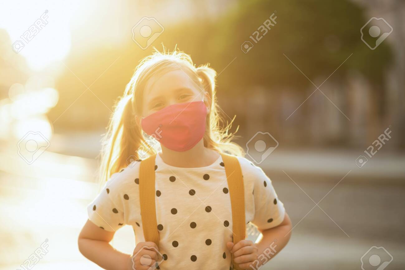 yellow and white polka dot blouse