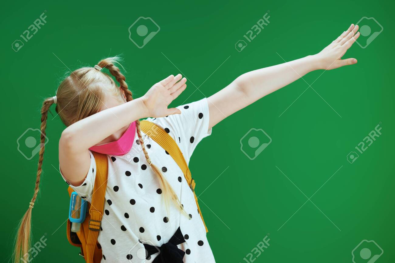 yellow and white polka dot blouse