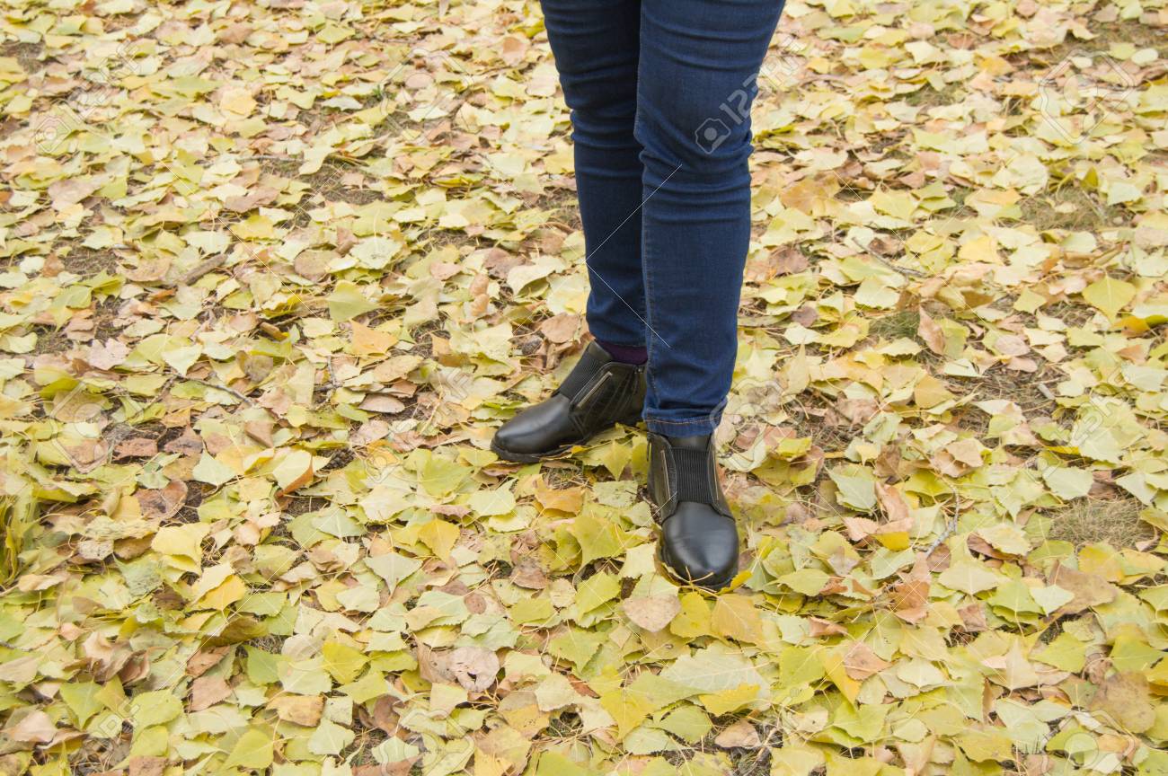 light blue jeans and black boots