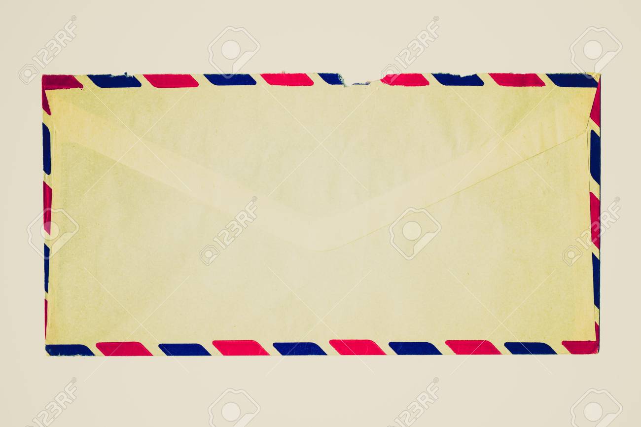 vintage looking letter or small packet envelope isolated over small envelope