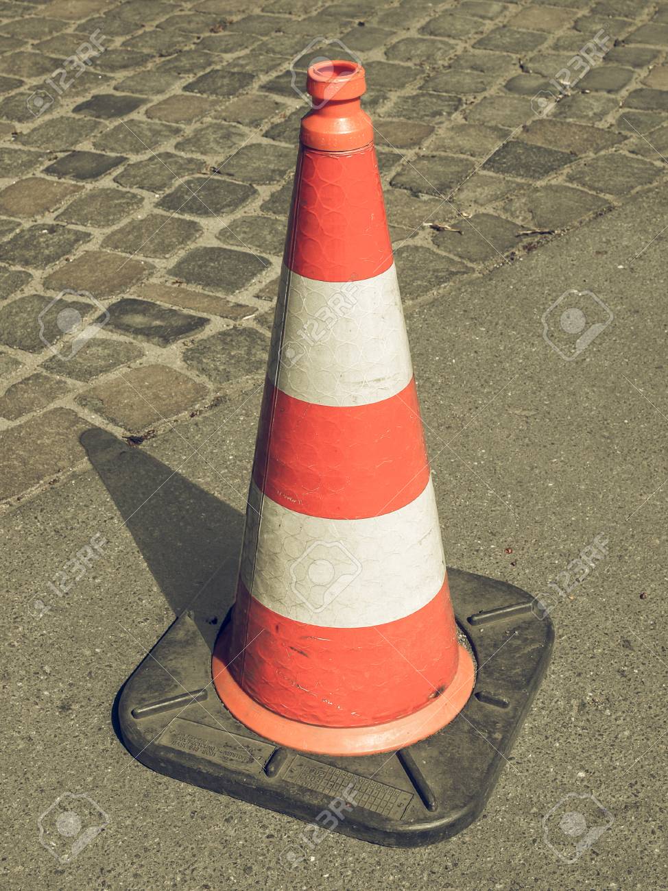 Vintage Looking Traffic Cone Used In Street Road Works Stock Photo, Picture  And Royalty Free Image. Image 68718243.