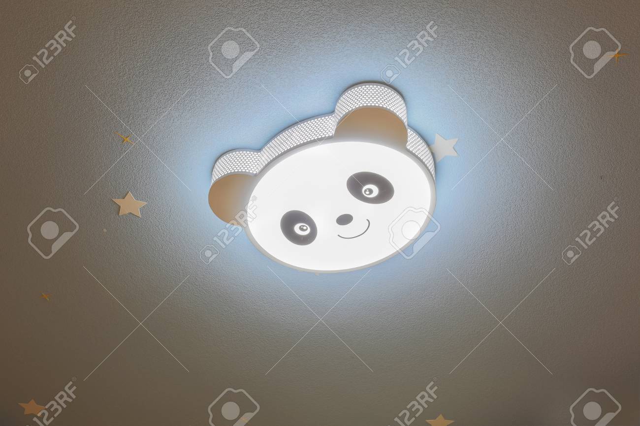 Blue Diatom Mud Ceiling And Panda Shaped Light Stock Photo