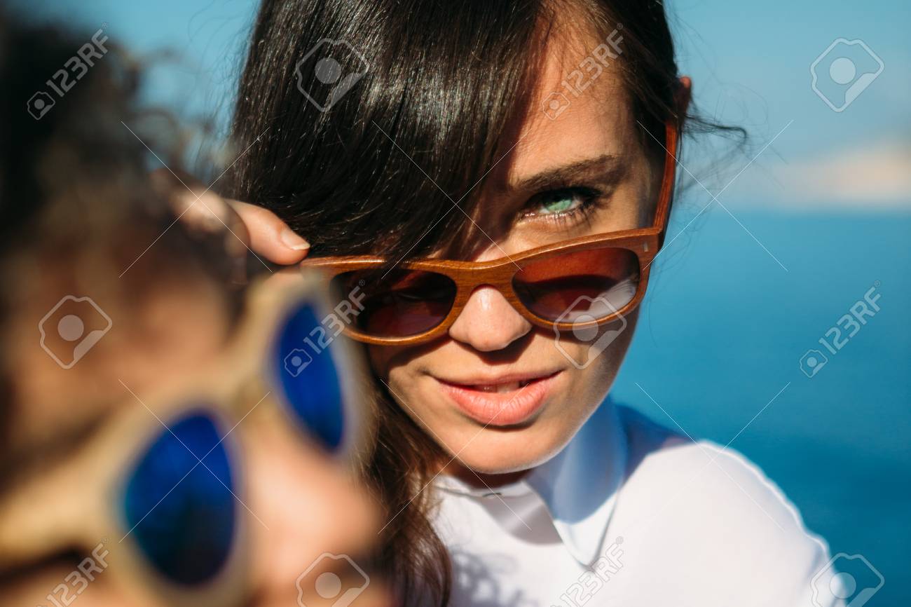 Portrait Of Pretty Brunette Girl Looking At Camera Over Sunglasses Stock Photo Picture And Royalty Free Image Image Portrait Of Pretty Brunette Girl Looking At Camera Over Sunglasses Stock Photo Picture And Royalty Free Image Image