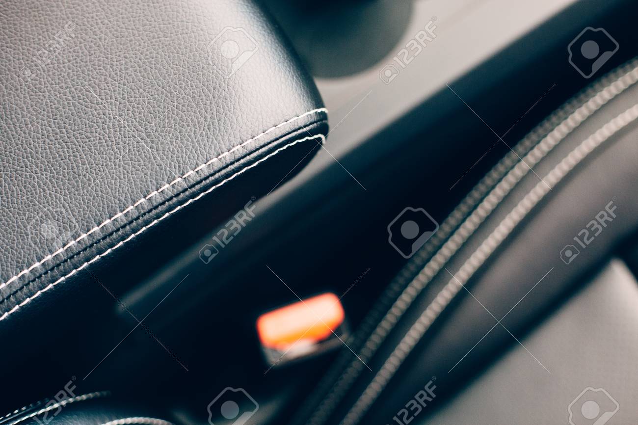 Car Leather Upholstery >> Cropped View Of A Front Armrest In Handmade Black Leather Upholstery Car Leather Upholstery >> Cropped View Of A Front Armrest In Handmade Black Leather Upholstery