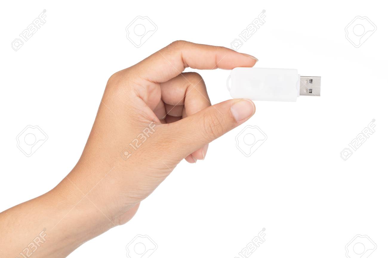 hand holding A white of USB flash memory isolated on a white background. - 104363734 hand holding A white of USB flash memory isolated on a white background. - 104363734