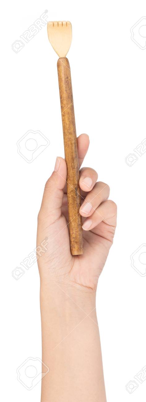 Hand Holding Wood To Scratch Back Isolated On A White Background.  Фотография, картинки, изображения и сток-фотография без роялти. Image  108574590