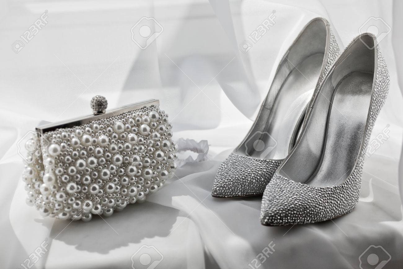 matching silver shoes and bag