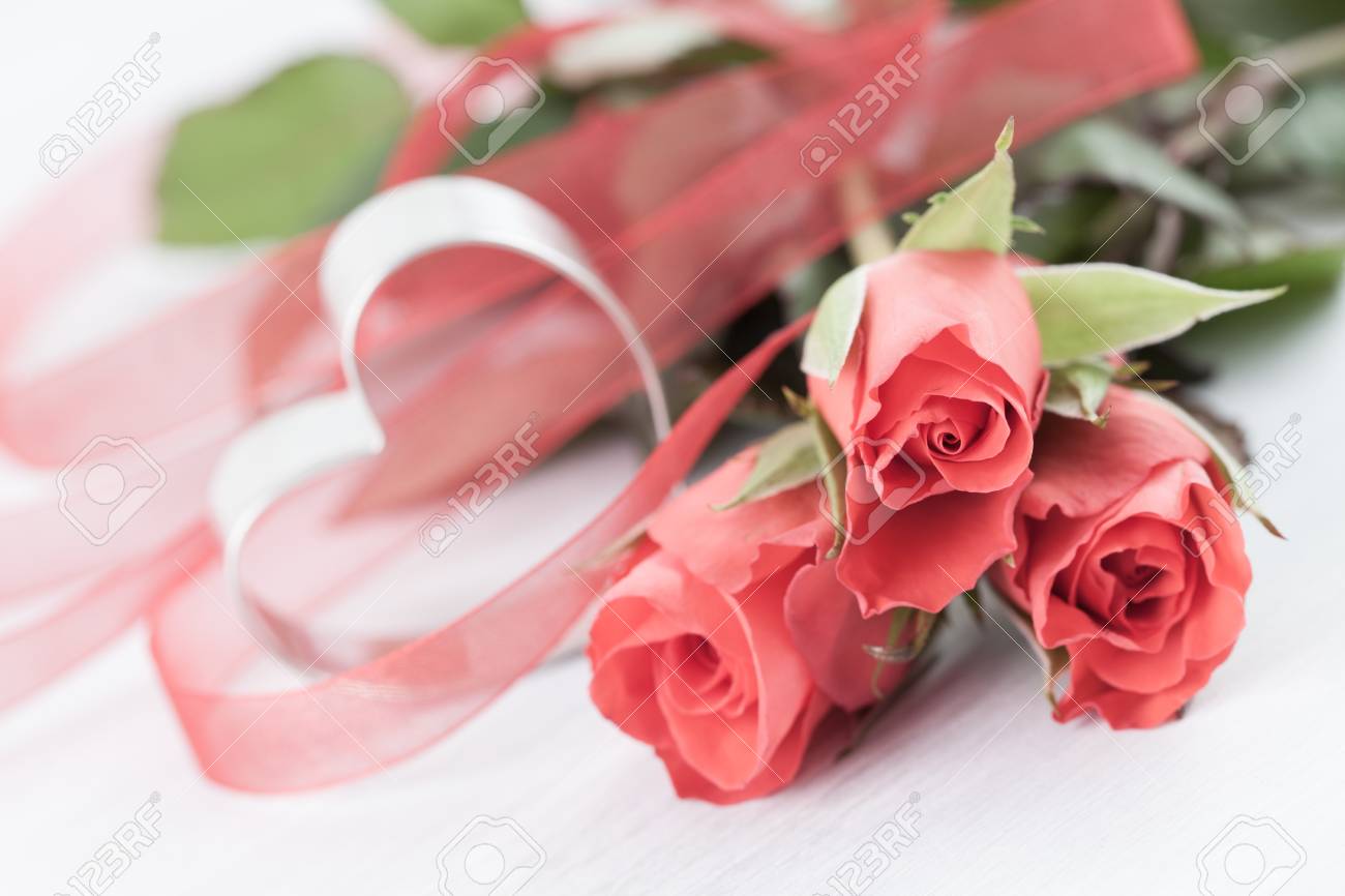 Three Roses And Heart Shape Stock Photo Picture And Royalty Free Image Image