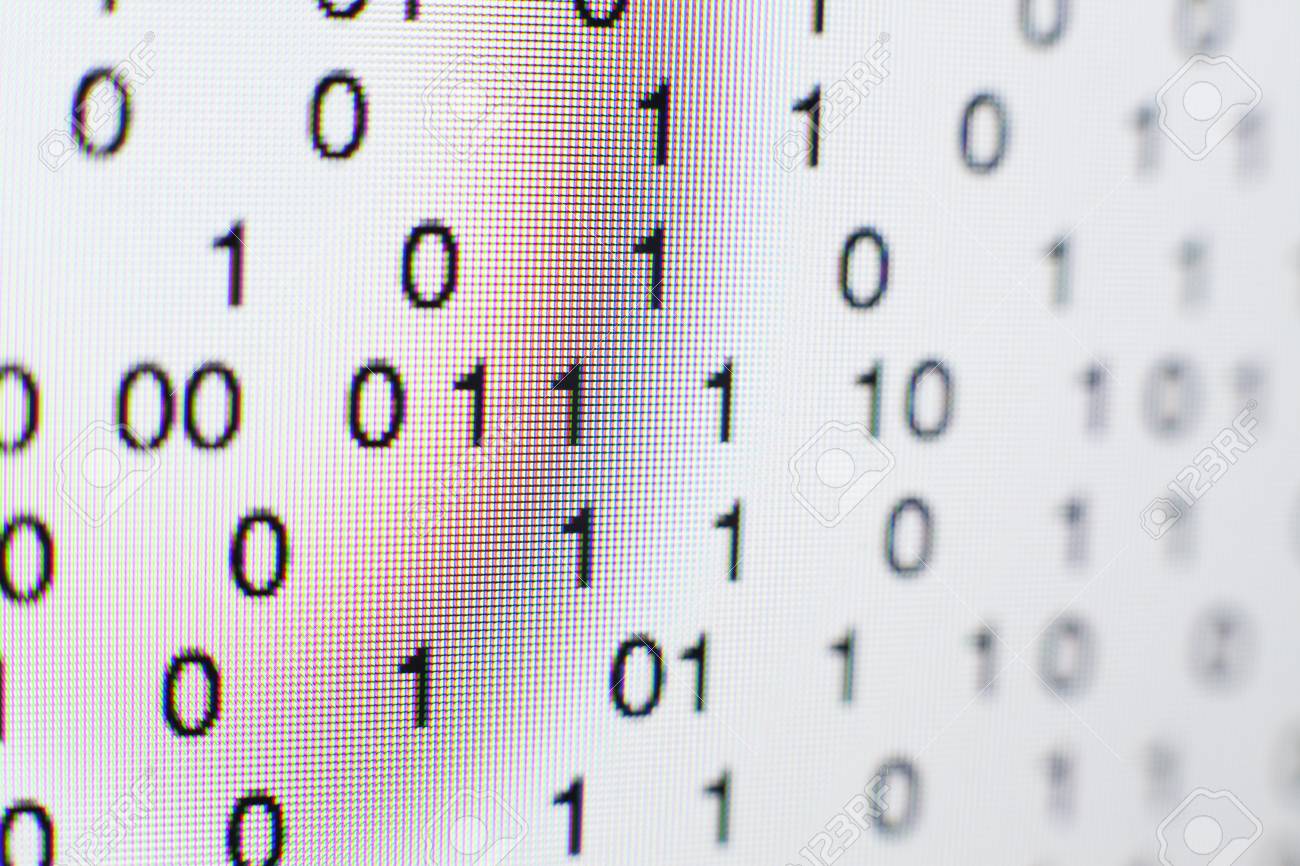 Binary code on a computer screen - 73026951 Binary code on a computer screen - 73026951