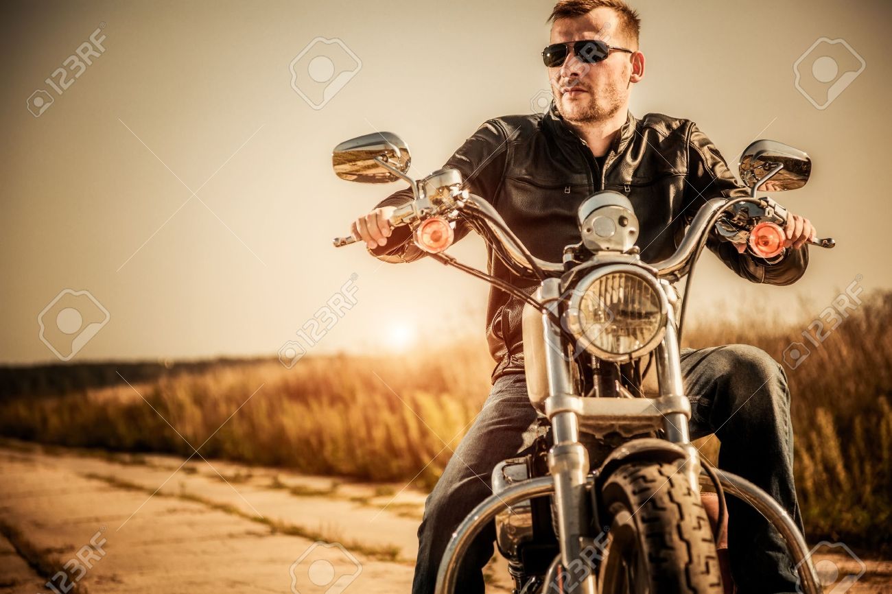 biker man sits on