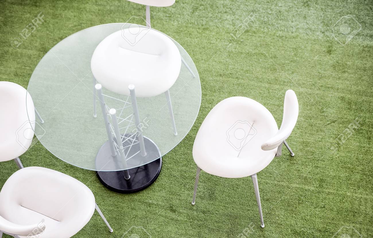 glass table top view modern stock photo top view of glass tables and white chairs on green background in modern office view of glass tables and white chairs on green background glass table top view modern stock photo top view of glass tables and white chairs on green background in modern office view of glass tables and white chairs on green background