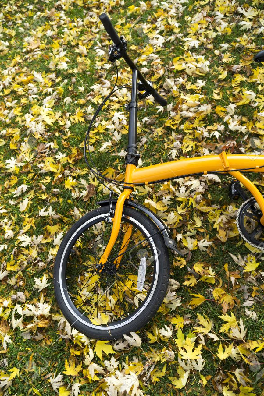 yellow folding bike