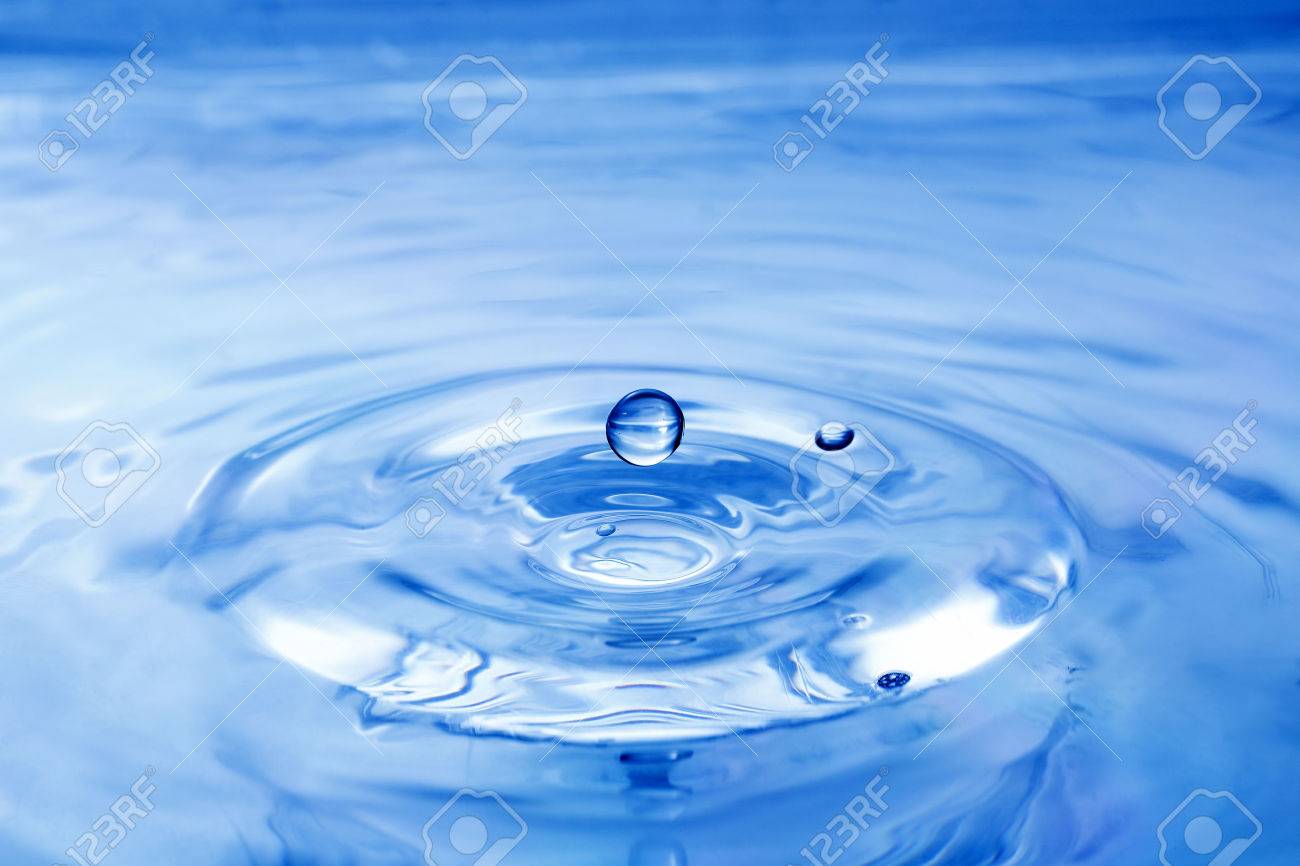 water drop over rippled water surface - 32758981 water drop over rippled water surface - 32758981