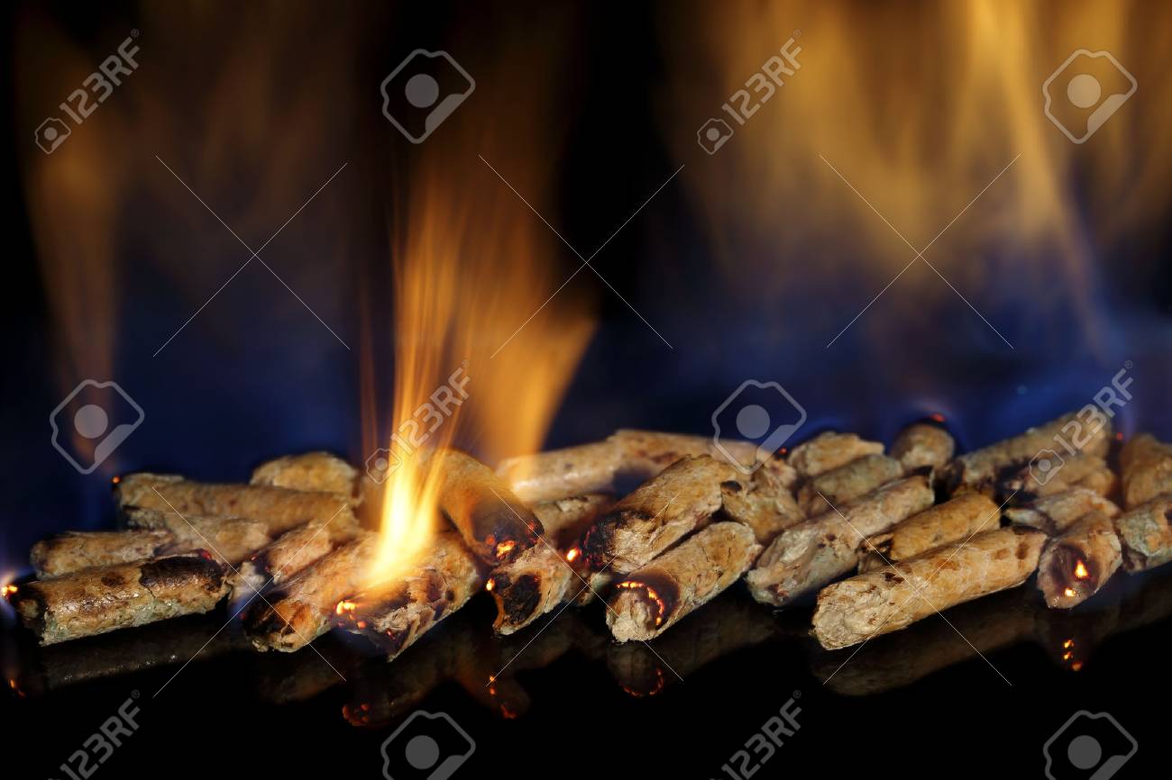 amount of burning wood pellets closeup - 33248135 amount of burning wood pellets closeup - 33248135