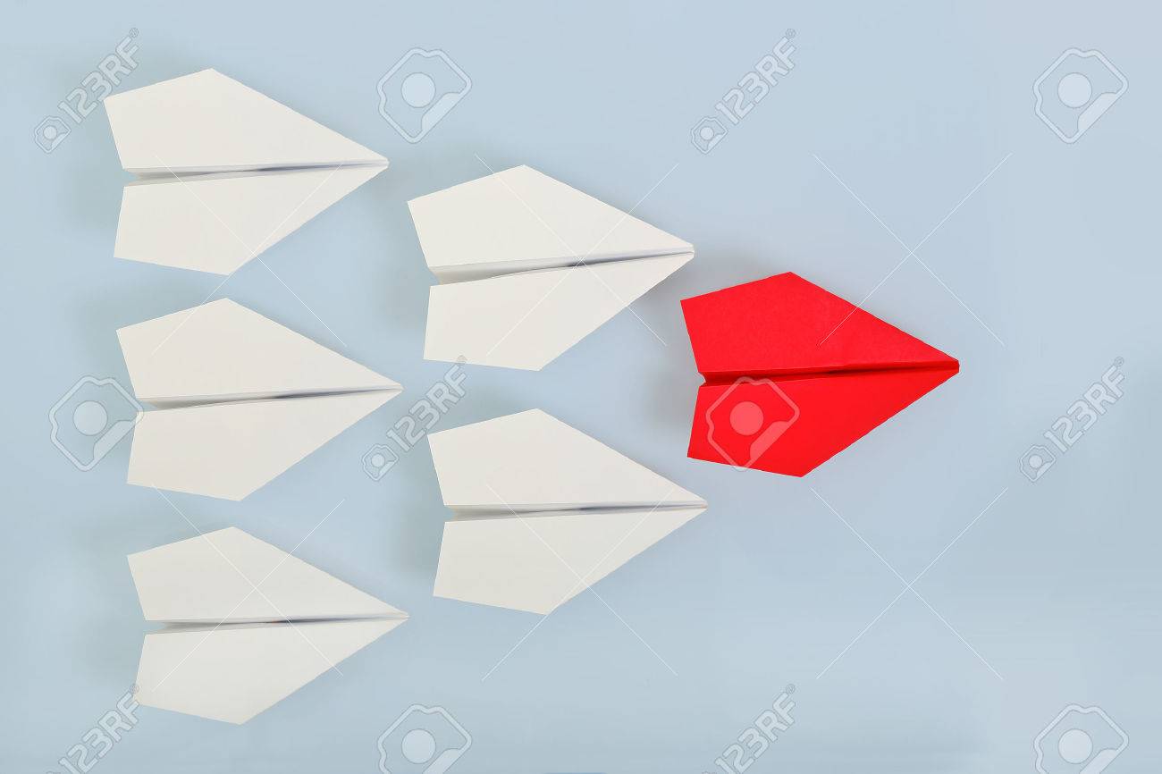 red paper plane leading white ones, leadership concept - 42303362 red paper plane leading white ones, leadership concept - 42303362