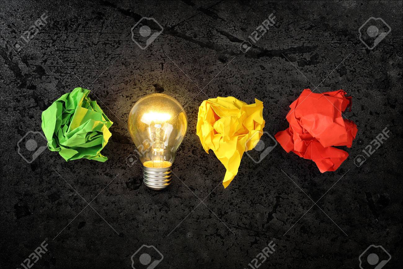 lit lightbulb with crumpled paper balls, idea or inspiration concept - 47213702 lit lightbulb with crumpled paper balls, idea or inspiration concept - 47213702