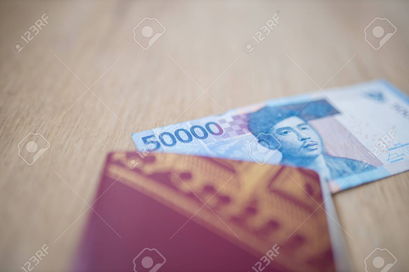 Corner Of A Fifty Thousand Rupees Bill Partially Inside A Swedish Passport Stock Photo Picture And Royalty Free Image Image 157511486