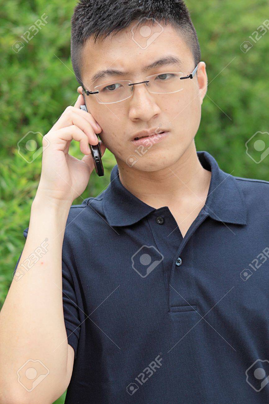 Chinese Man Talking Phone And Worry Stock Photo Picture And Royalty Free Image Image 10662272