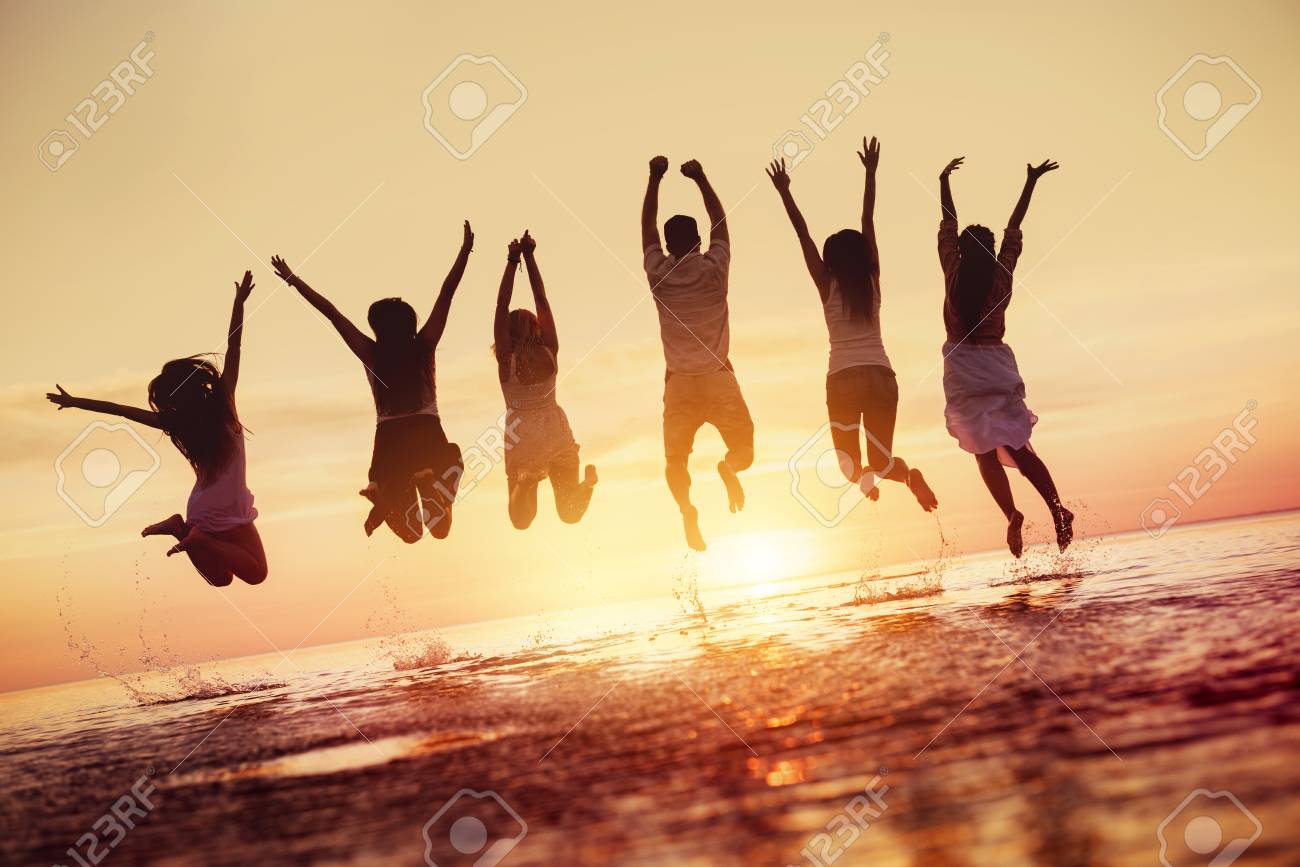 Group Of Happy Friends Jumps In Sunset Water Stock Photo Picture And Royalty Free Image Image 109100888