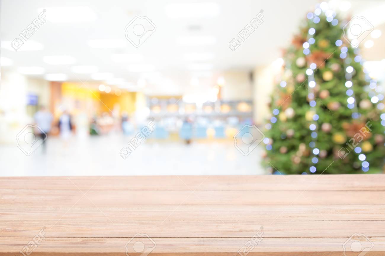 Empty Wooden Table Top Over Blurred Abstract Of Decorated