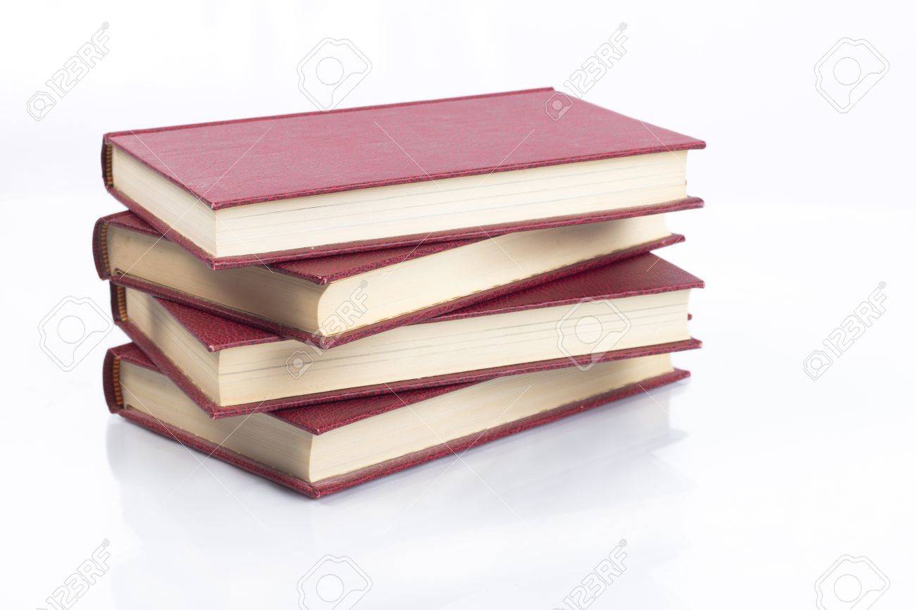 red stacked books on white background isolated stock photo picture