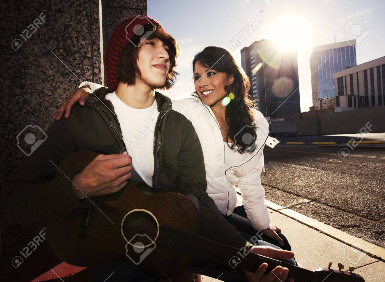 Hispanic Musician And Latina Girlfriend Downtown At Sundown Stock Photo 4103856 Hispanic Musician And Latina Girlfriend Downtown At Sundown Stock Photo 4103856