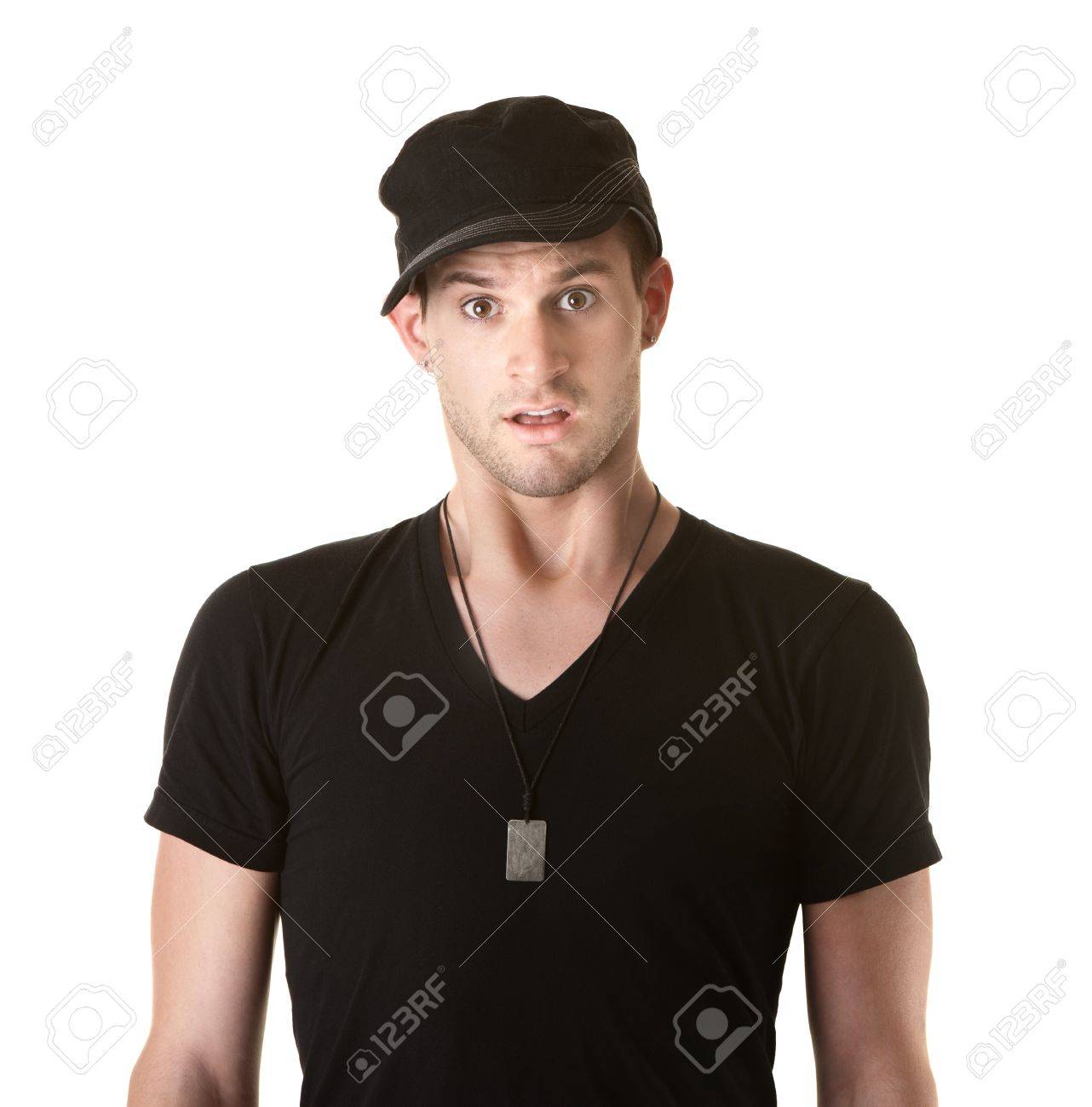 白い背景の上の上げられた眉毛でショックを受けた若い白人男性 の写真素材 画像素材 Image