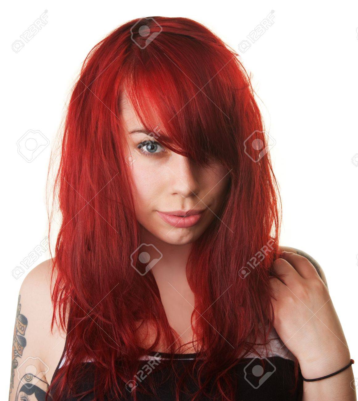 白い背景の上の汚い髪で欲求不満な若い女 の写真素材 画像素材 Image